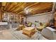Basement features play area, exposed ceiling and concrete floors at 107 Grand Ave, Suwanee, GA 30024