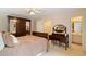 Bedroom featuring dark wood furniture and attached bath at 107 Grand Ave, Suwanee, GA 30024