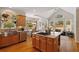Open concept kitchen with stainless steel appliances, large sink, and great natural light at 107 Grand Ave, Suwanee, GA 30024