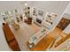 Aerial view of a living room featuring a fireplace and large windows at 107 Grand Ave, Suwanee, GA 30024