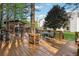 Enjoy outdoor living on this back deck featuring an outdoor kitchen and dining area at 192 Palisade Point Dr, Ellenwood, GA 30294