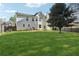 Large, well-maintained backyard with ample green space, perfect for outdoor activities and relaxation at 192 Palisade Point Dr, Ellenwood, GA 30294