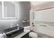 Modern bathroom with marble sink, and decorative wall-mounted vanity and finishes at 192 Palisade Point Dr, Ellenwood, GA 30294