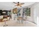 Bright dining area with tile flooring and natural light from a large window at 192 Palisade Point Dr, Ellenwood, GA 30294