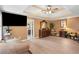 Spacious living room featuring hard wood floors, decorative ceiling and neutral paint at 192 Palisade Point Dr, Ellenwood, GA 30294
