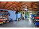 Unfinished basement with exposed ceiling, painted blue walls, and concrete flooring is ready to be renovated at 210 Mels Way, Stockbridge, GA 30281