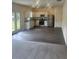 Open-concept kitchen with stainless steel appliances and ample counter space at 87 Sonoma Drive, Dallas, GA 30157