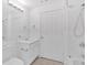 Bright bathroom featuring a shower and vanity with ample counter space at 1075 Peachtree Ne Walk # A421, Atlanta, GA 30309