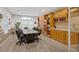 Well-appointed conference room with a large table, built-in cabinets, and elegant decor for meetings at 1075 Peachtree Ne Walk # A421, Atlanta, GA 30309