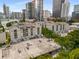 Attractive view of the building exterior featuring assigned parking at 1075 Peachtree Ne Walk # A421, Atlanta, GA 30309