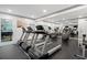 Modern gym equipped with treadmills, elliptical machines and a rower, perfect for cardio and fitness at 1075 Peachtree Ne Walk # A421, Atlanta, GA 30309