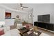 Bright living room featuring modern decor, stylish furnishings, and wood-look floors at 1075 Peachtree Ne Walk # A421, Atlanta, GA 30309