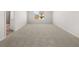Spacious bedroom with plush carpet and a view of the backyard at 120 Hampton Ter, Dallas, GA 30157