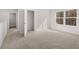 Bright bedroom featuring carpet flooring and a walk-in closet at 120 Hampton Ter, Dallas, GA 30157
