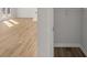 Spacious walk-in closet with wood floor and closet organization system at 120 Hampton Ter, Dallas, GA 30157