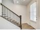 Entryway featuring a staircase, durable floors, and neutral colors at 1263 Harvest Park Ln, Suwanee, GA 30024