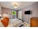 Comfortable bedroom with neutral paint, large window, and modern accents at 298 Birch St, Atlanta, GA 30354