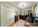Bedroom features large closet, built in dresser, and views of the property at 298 Birch St, Atlanta, GA 30354