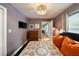 Bedroom with warm accents, ample storage, and lots of natural light at 298 Birch St, Atlanta, GA 30354