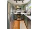 Well-lit kitchen features stainless steel appliances and bright countertops at 298 Birch St, Atlanta, GA 30354