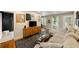 Open living room showcasing a large sectional and stylish decor at 298 Birch St, Atlanta, GA 30354