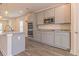 Stylish kitchen with stainless steel appliances, granite countertops, and ample cabinet space at 208 Crabapple St, Mcdonough, GA 30253