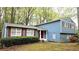 Charming home featuring blue siding, red shutters, and a well-maintained front yard at 2912 Pathview Ln, Marietta, GA 30062