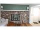 Cozy living room features a unique stone fireplace with stained glass artwork at 2912 Pathview Ln, Marietta, GA 30062