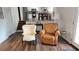 Bright living room with hardwood floors and staircase to dining and kitchen at 2912 Pathview Ln, Marietta, GA 30062