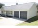 Home's garage featuring two doors for convenience at 6737 Mason Creek Rd, Douglasville, GA 30135