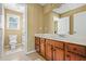 Bathroom featuring vanity with dark wood cabinetry and a shower/tub combination at 1041 Sweetwater Bridge Cir, Douglasville, GA 30134