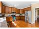 Open kitchen with stainless steel appliances, ample cabinet space and granite counters at 1041 Sweetwater Bridge Cir, Douglasville, GA 30134