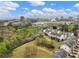 Aerial view of a community, showing landscaping, walking path, and nearby park at 3501 Chattahoochee Summit Se Ln, Atlanta, GA 30339
