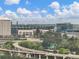 Scenic aerial view of a stadium near lush green trees and city buildings under a partly cloudy sky at 3501 Chattahoochee Summit Se Ln, Atlanta, GA 30339