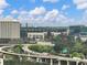 Highway view near buildings and green trees with a partly cloudy sky at 3501 Chattahoochee Summit Se Ln, Atlanta, GA 30339