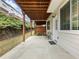 Spacious outdoor patio with green landscape, adjacent to the house, perfect for relaxation and enjoying nature at 3501 Chattahoochee Summit Se Ln, Atlanta, GA 30339