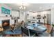 Open floorplan with kitchen, living room and dining area plus a fireplace at 3501 Chattahoochee Summit Se Ln, Atlanta, GA 30339