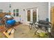 Outdoor patio area with furniture, a grill, and a view of the backyard at 3541 Condor Ct, Atlanta, GA 30331