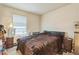 A bedroom featuring a bed and a window that allows light to enter the room at 3541 Condor Ct, Atlanta, GA 30331