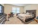 Comfortable bedroom featuring a large bed, a window, and a well-lit ambiance at 3541 Condor Ct, Atlanta, GA 30331