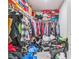 Walk-in closet piled high with clothing, shoes, and accessories, offering ample storage space at 3541 Condor Ct, Atlanta, GA 30331