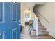 Entryway displaying the staircase and the living area, creating an inviting ambiance at 3541 Condor Ct, Atlanta, GA 30331