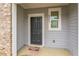 Inviting front door of the house, showcasing the address number, and a welcome mat at 3541 Condor Ct, Atlanta, GA 30331