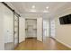Bedroom offers hard wood floors, a tray ceiling, and access to a full closet at 5132 Foxwood Ct, Atlanta, GA 30360
