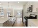 Modern kitchen features stainless steel appliances, marble countertops, and pendant lighting fixtures at 5132 Foxwood Ct, Atlanta, GA 30360