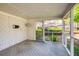 Covered porch featuring painted brick, a painted floor, and white trim at 5132 Foxwood Ct, Atlanta, GA 30360