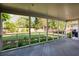 Spacious screened-in porch with a view of the beautiful backyard at 5132 Foxwood Ct, Atlanta, GA 30360