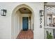 Inviting entryway with brick mosaic flooring and modern lighting fixtures creates a warm welcome at 878 Dill Sw Ave, Atlanta, GA 30310