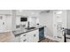 Modern kitchen featuring stainless steel appliances, a sleek countertop, and lots of natural light at 878 Dill Sw Ave, Atlanta, GA 30310