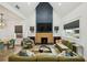 Spacious living room with vaulted ceiling, fireplace, and ample natural light at 878 Dill Sw Ave, Atlanta, GA 30310
